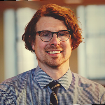 headshot of dan schneider